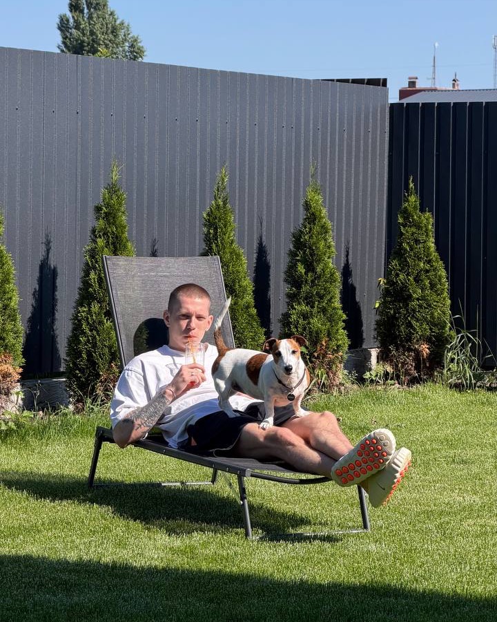 Chilling on a sun lounger with my dog