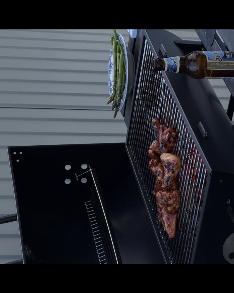 Chicken on the grill, asparagus waiting